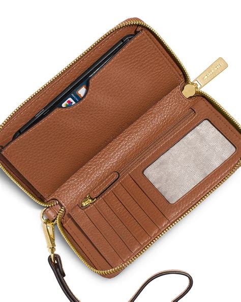 phone charging wallet michael kors|Michael Kors Wallet real.